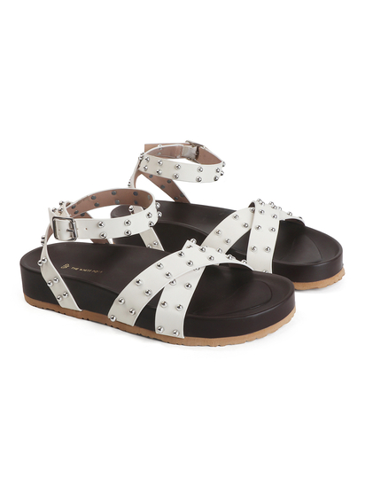 White Open-Toe Flats With Silver Studs and Criss-Cross Ankle Strap Design